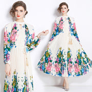 WomenPrinted Lantern Sleeve Pleated Tassel Belt Dress - Premium 0 from Nobles Store - Just $36.35! Shop now at Nobles Store