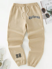 Men Apparel, Men Bottoms, Men Clothing, Men SweatpantsManfinity Men Letter Graphic Drawstring Waist Sweatpants - Premium  from Nobles Store - Just $41.90! Shop now at Nobles Store