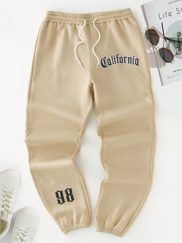 Men Apparel, Men Bottoms, Men Clothing, Men SweatpantsManfinity Men Letter Graphic Drawstring Waist Sweatpants - Premium  from Nobles Store - Just $41.90! Shop now at Nobles Store
